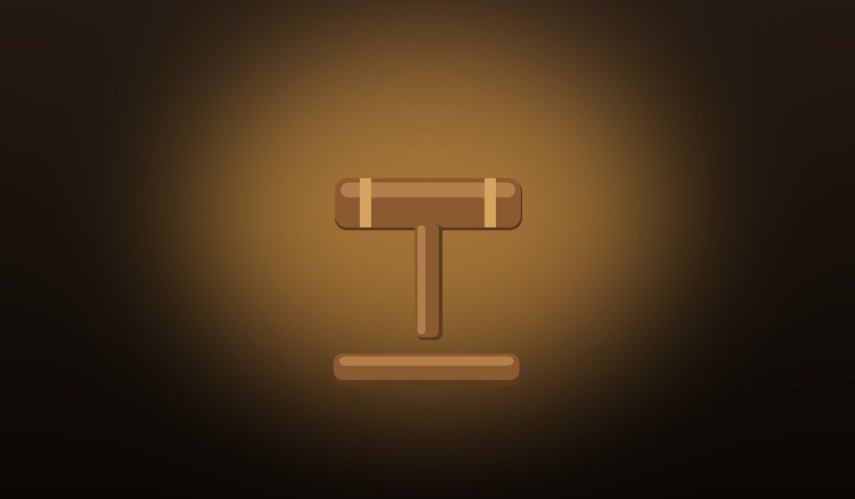Auction gavel selling rare coins, watches and fine jewelry to the highest bidder